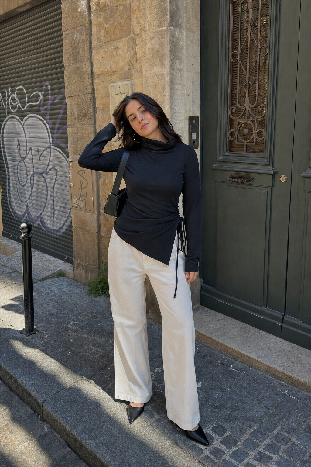 Elara Voss Obsidian Drape Black Top on model 1