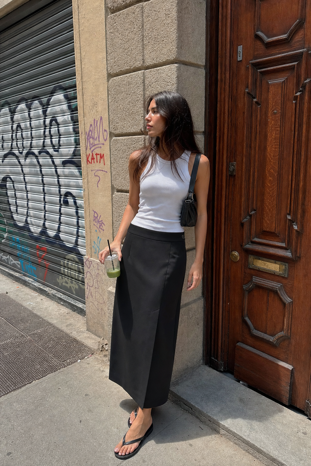 Elara Voss Tailored Column Black Skirt on model 2